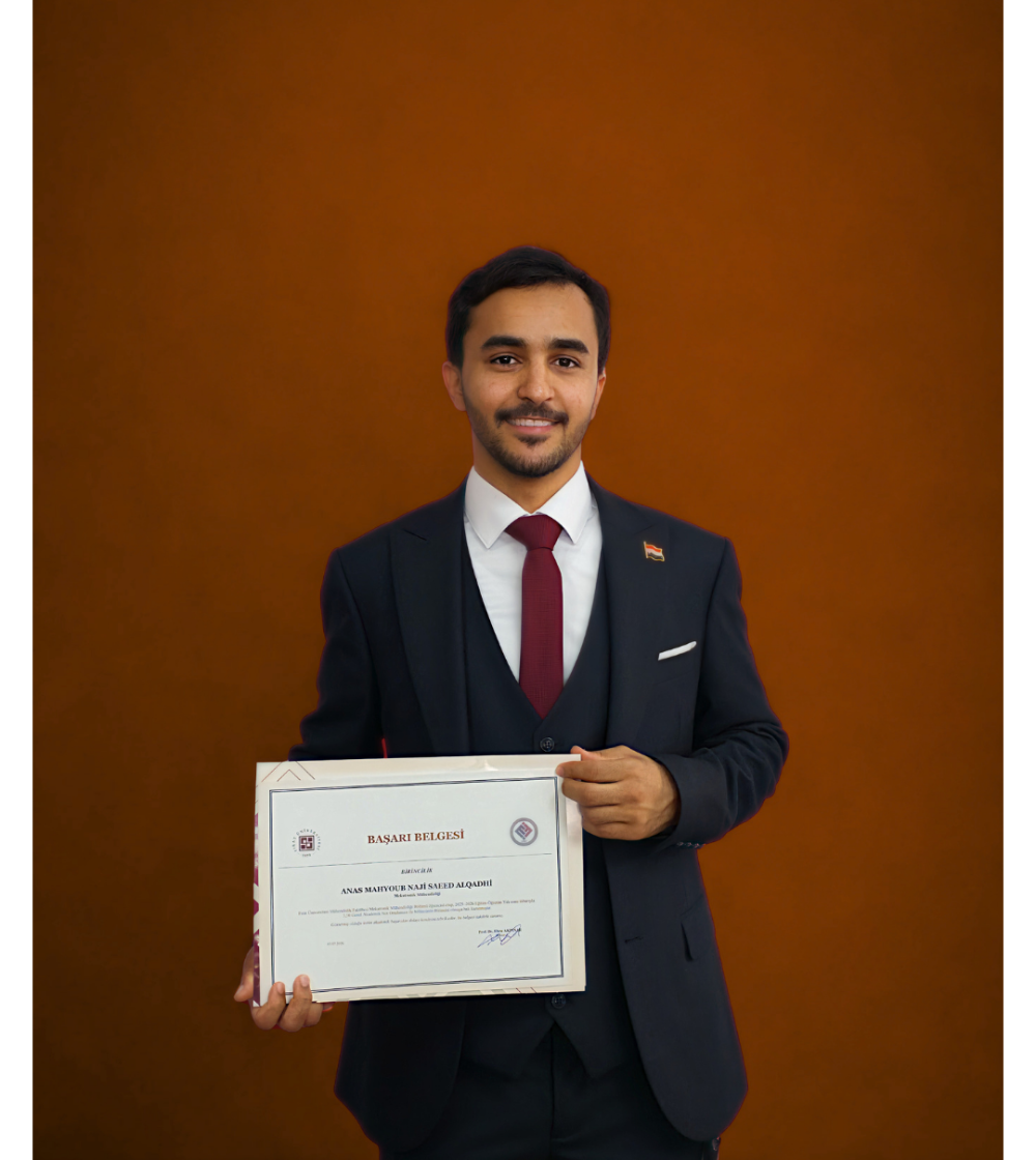 Anas Alqadhi holding his Faculty First Place certificate